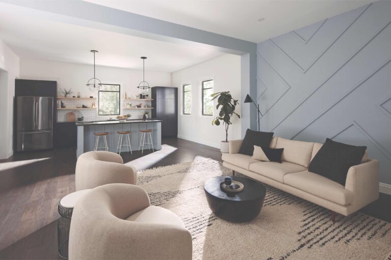 Wide view of minimalist living room with crown molding
